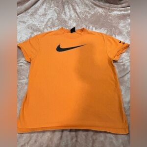 Women’s Nike long tee shirt orange size medium
Medium OVERSIZED
